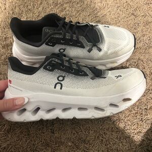 On Running Black and White Athletic Shoes